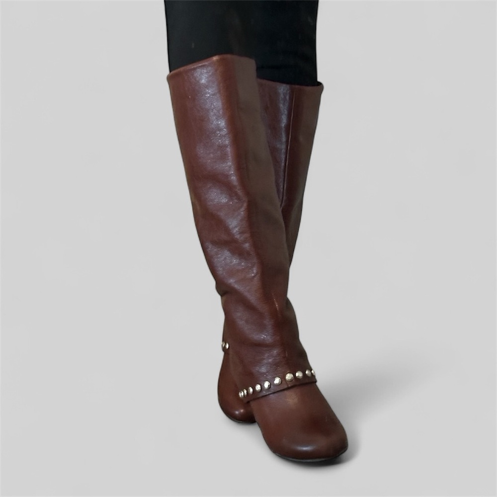 Brown leather knee-high boots with silver studs